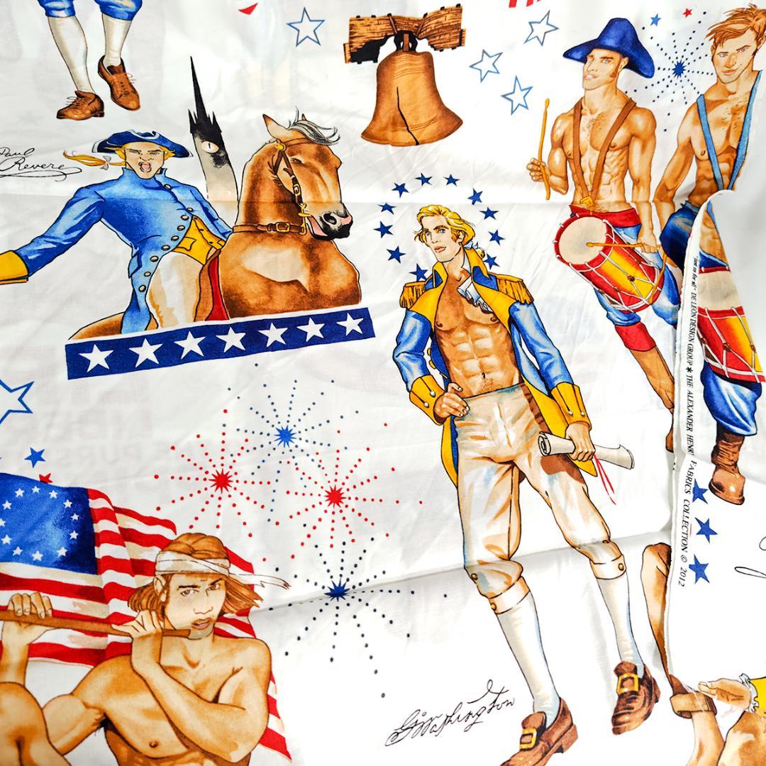 Close-up of printed cotton fabric showing illustrated colonial-era men, an American flag, a horse, a Liberty Bell, and patriotic motifs.