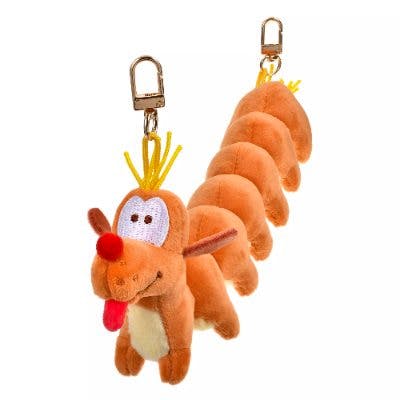 Plush multi-strap keychain of a dog-like insect character in orange-brown with two gold clasps.