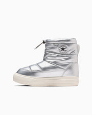 Side profile of a metallic silver high-top boot on a white background.