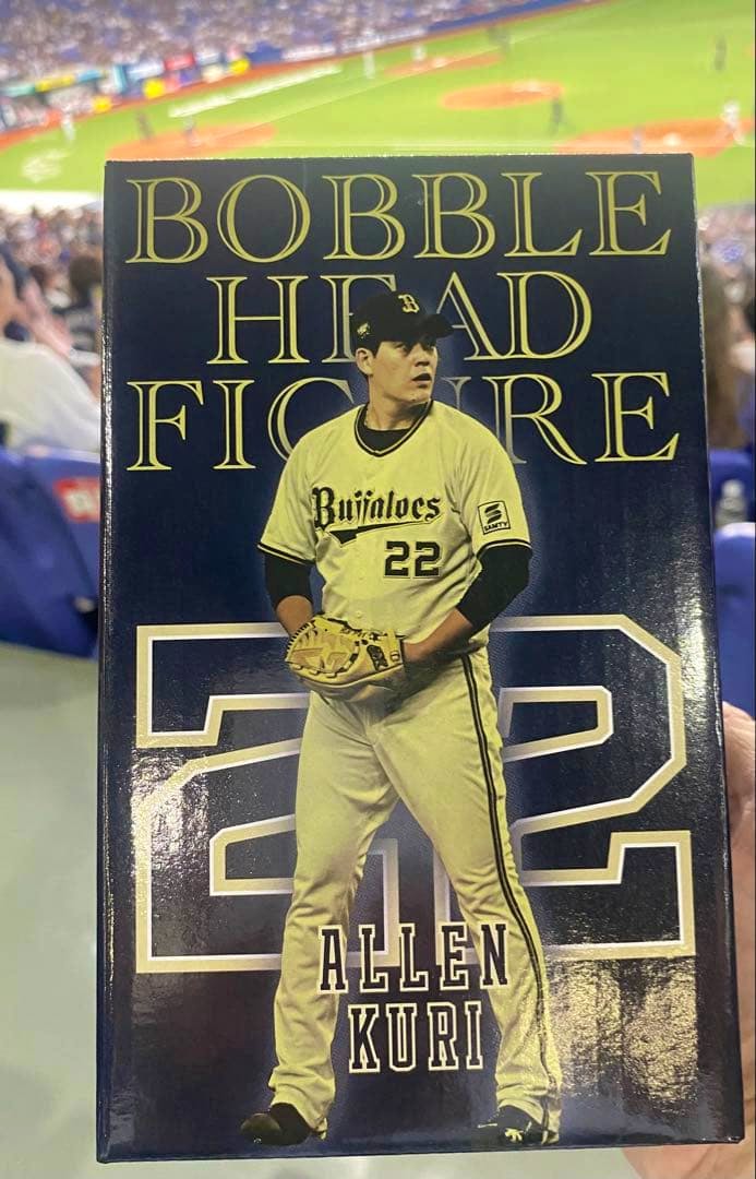 Front of the bobblehead figure box showing an Orix Buffaloes pitcher wearing number 22 with the name "ALLEN KURI" on the packaging.
