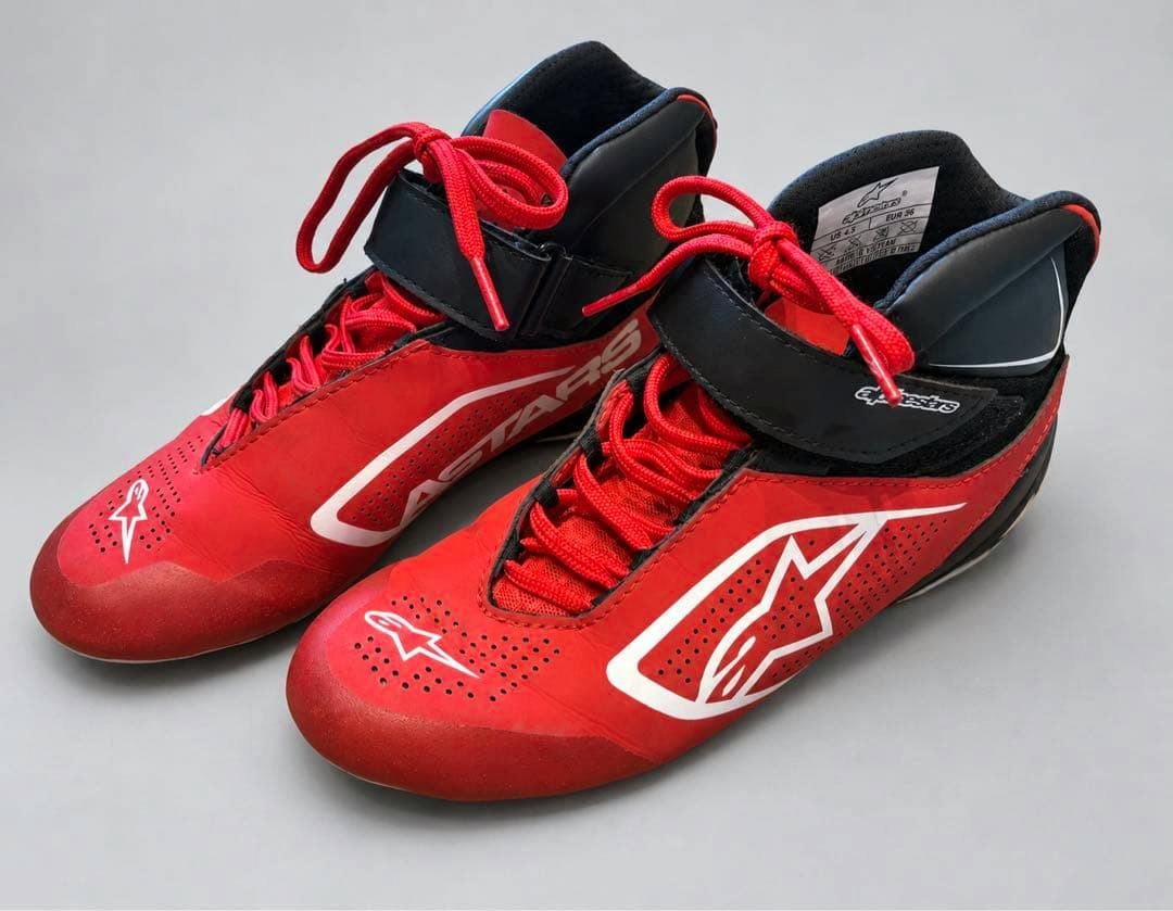 Red and black Alpinestars kart racing shoes (EUR36 US4.5) shown from an angled top view on a gray background.