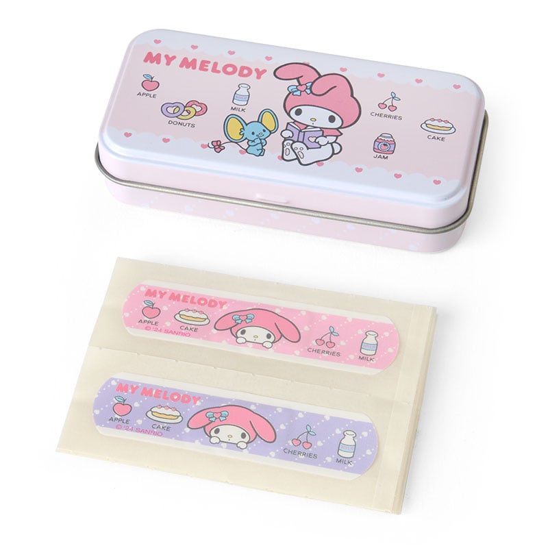 A pink decorated tin case with two printed adhesive bandages displayed in front.