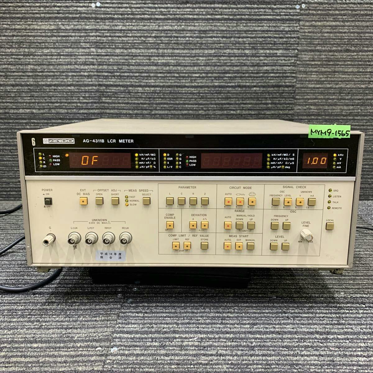 Front view of an ANDO AG-4311B LCR meter showing the display, front-panel controls, and input connectors.