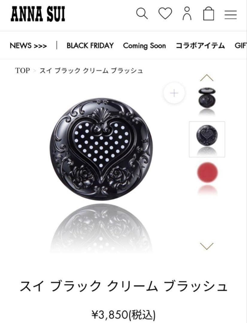Closed black decorative compact for ANNA SUI cream blush showing a heart-shaped polka-dot design on the lid.