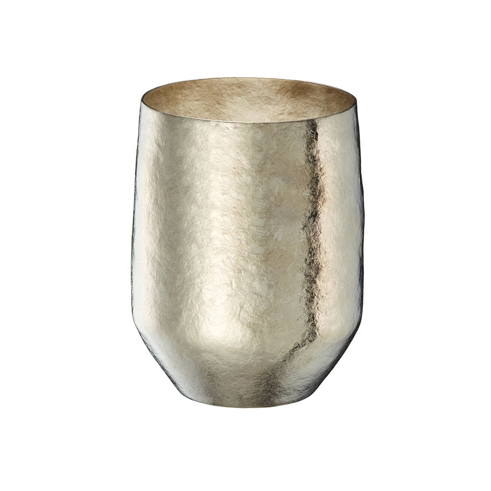 Antique gold goblet with a textured surface shown against a white background.