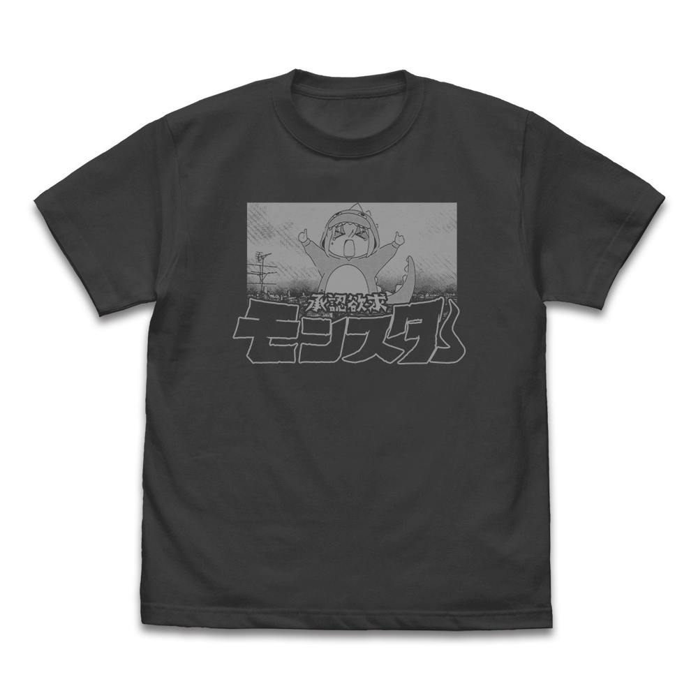 Front view of a black cotton T-shirt showing the anime graphic of a small dinosaur-costumed character and bold Japanese text printed on the chest.