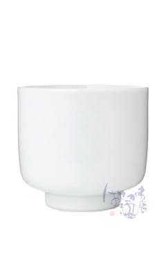 White Arita-yaki ceramic tasting cup photographed from the side on a white background.