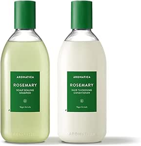 Two AROMATICA bottles side by side: a rosemary scalp scaling shampoo and a rosemary hair thickening conditioner.