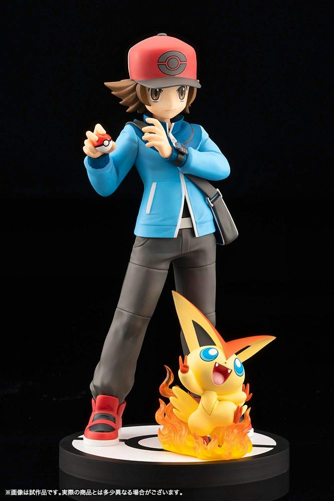 Plastic figure of トウヤ (Touya) holding a Poké Ball with ビクティニ (Victini) posed on the base.