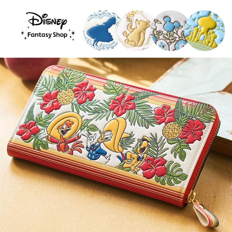 Long zip-around cow leather wallet with a colorful tropical floral print and character illustrations on the front.