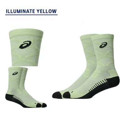 Three views of a pair of light yellow crew running socks with ASICS logo and black heel and toe accents.