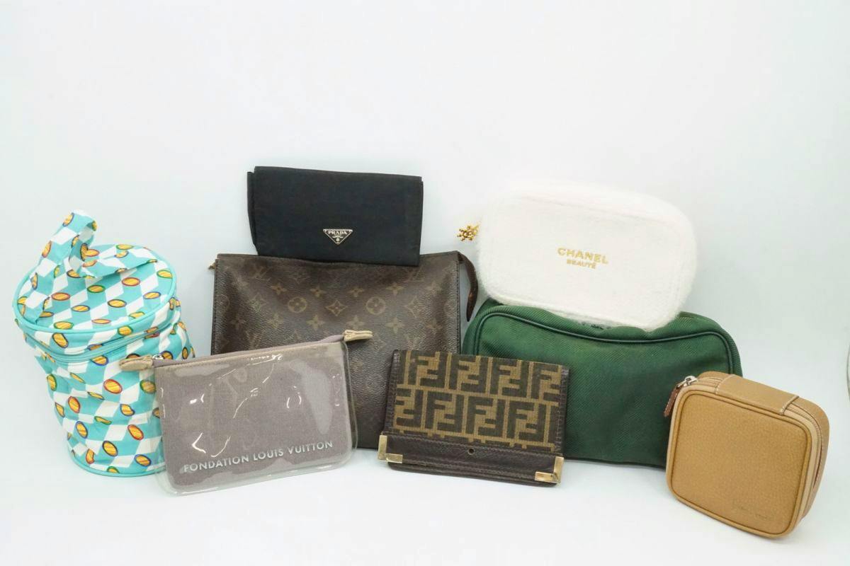 Eight assorted brand pouches and small bags arranged on a white background.