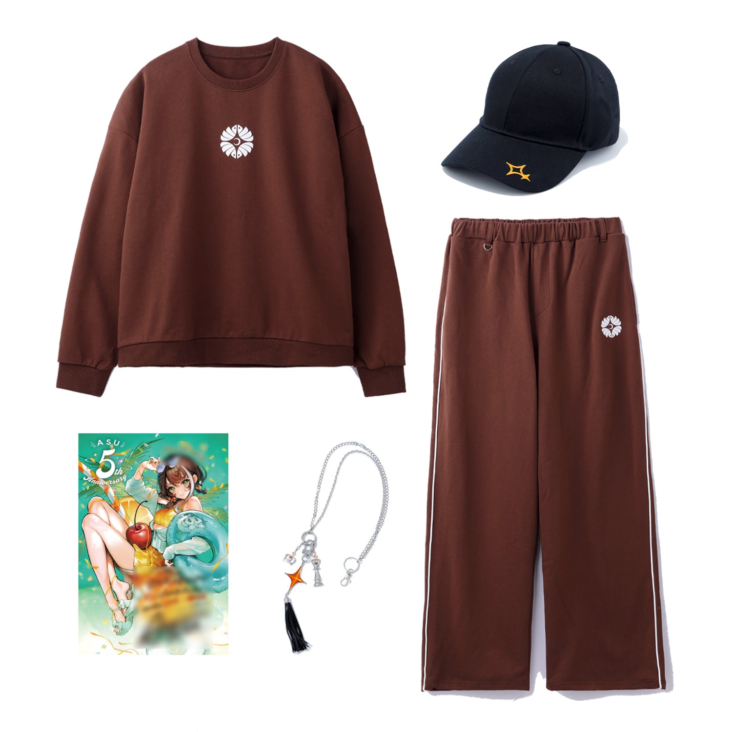 A brown sweatshirt displayed with matching pants, a cap, a postcard, and a chain accessory.