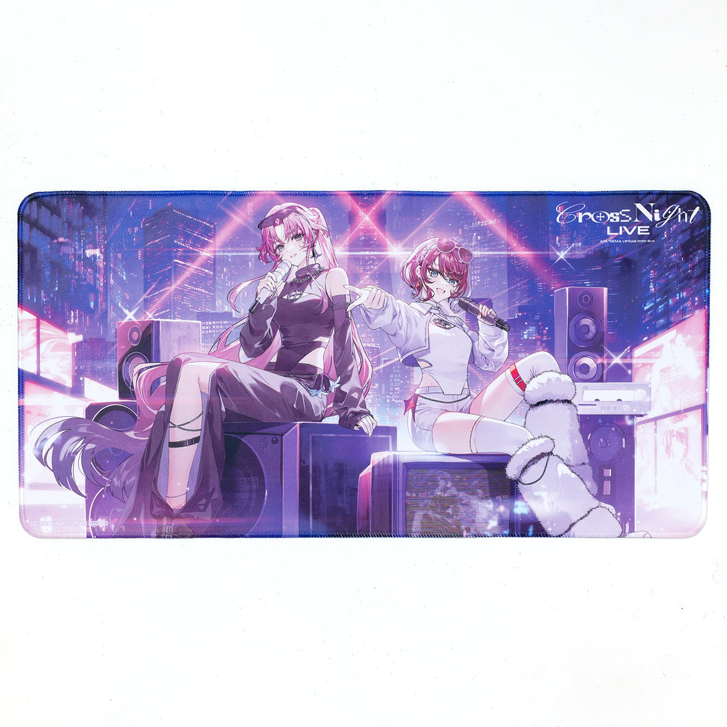 Rubber desk mat showing two anime characters seated on speakers in a neon city background with “Cross Night LIVE” text.