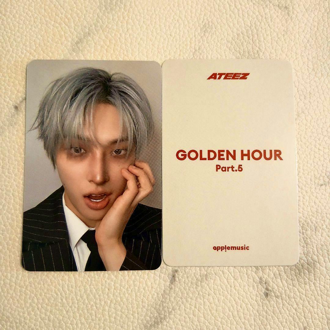 Two photocards side-by-side on a textured surface: the left card shows a close-up portrait of a person in a suit, and the right card reads “ATEEZ” and “GOLDEN HOUR Part.5” with an “applemusic” logo.