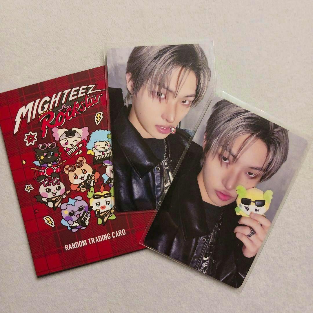 Photo of ATEEZ MIGHTEEZ photocard items showing two Mingi photocards alongside a red MIGHTEEZ Rockstar random trading card.