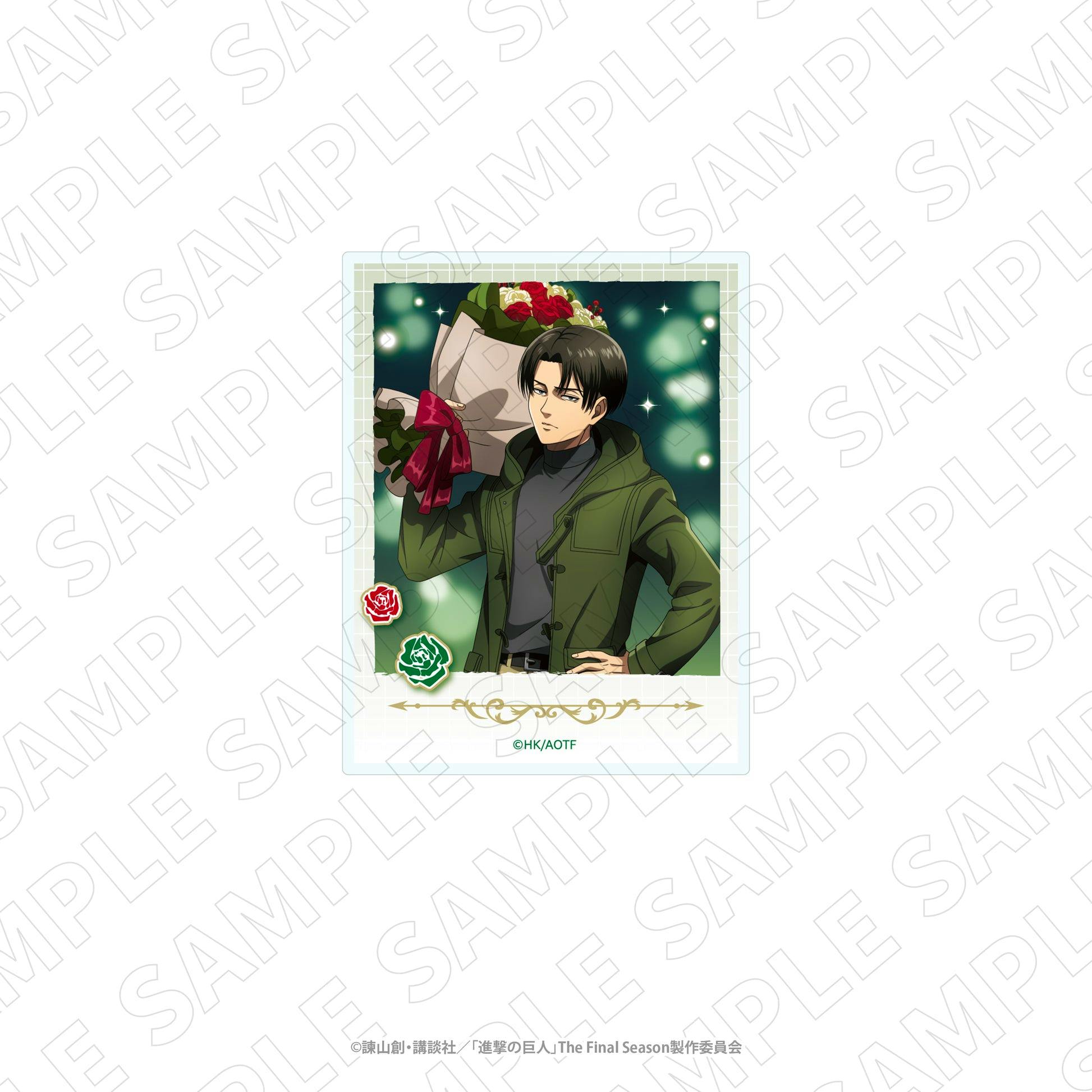 Polaroid-style acrylic card showing Levi holding a bouquet of flowers against a green bokeh background.