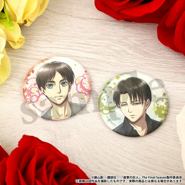 Two washi-style can badges featuring Eren and Levi from Attack on Titan on a light wood surface with roses.