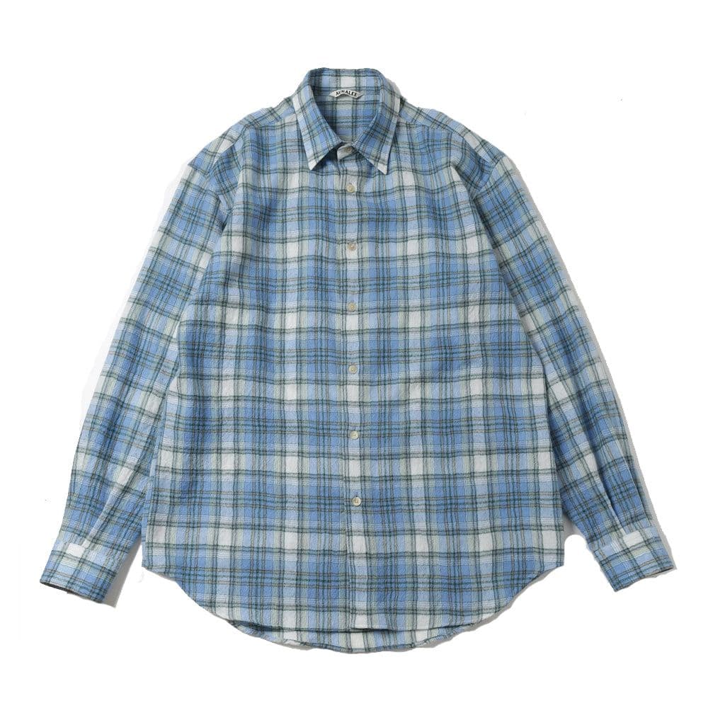 Blue and white check long-sleeve wool shirt laid flat on a white background.