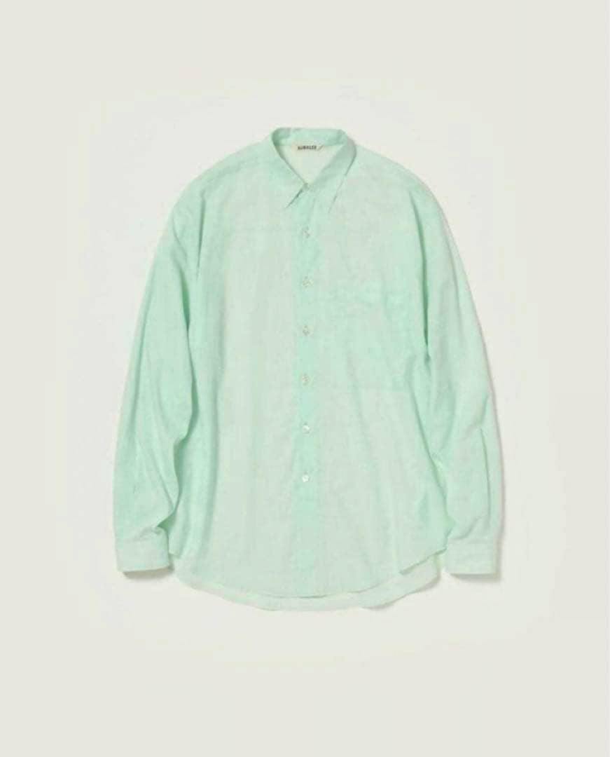 A mint-green men's long-sleeve cotton lawn button-up shirt laid flat on a light background.
