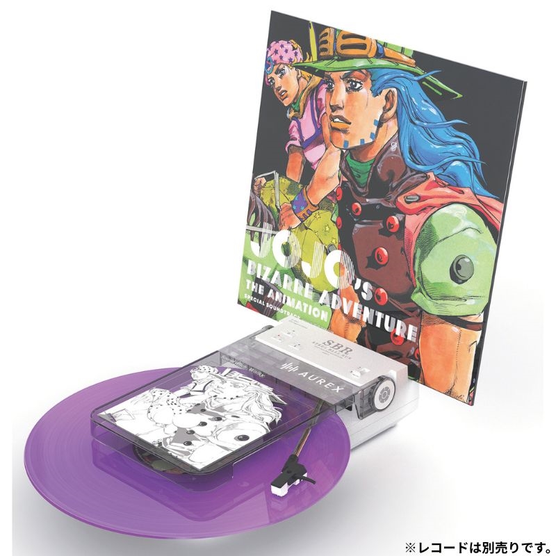 AUREX AX-RP10 record player with a purple vinyl on the platter and JoJo magazine artwork positioned behind it.