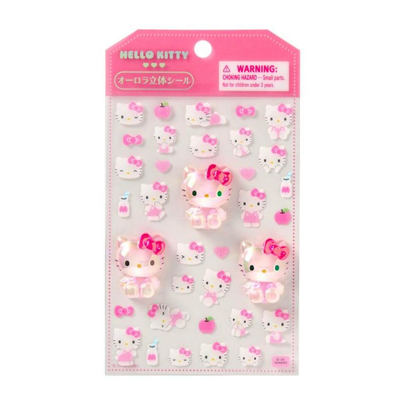 Packaged sheet of pink Hello Kitty aurora 3D stickers on a header card.