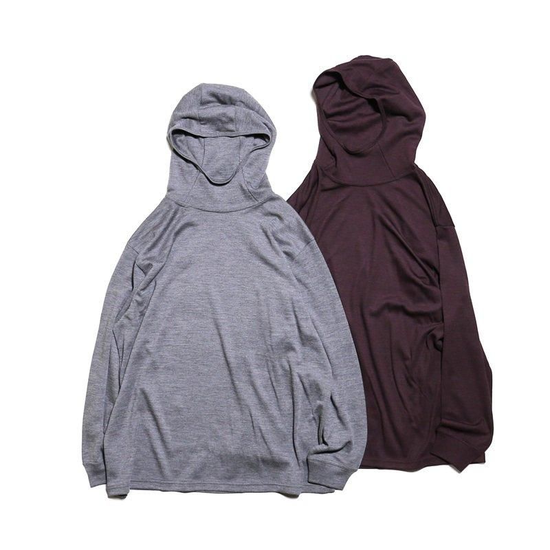 Two women's wool hoodies laid flat on a white background, one light gray and one dark burgundy, showing the front and hoods.
