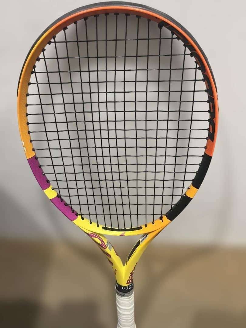 Front view of a Babolat PURE AERO RAFA tennis racket head and part of the shaft with strings visible.