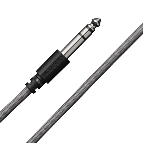 Close-up of a balanced jack audio cable plug and braided gray cable against a black background.