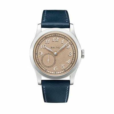 Front view of the Baltic micro-rotor watch showing a salmon textured dial and a blue leather strap.