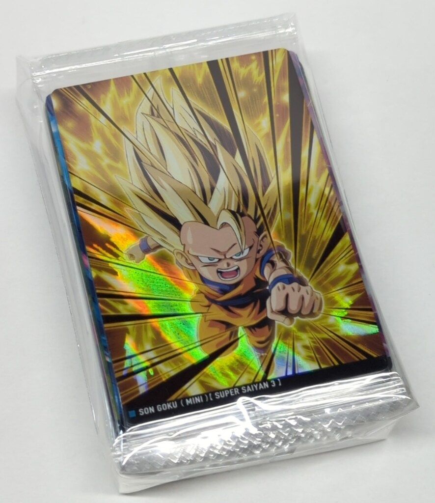 Sealed stack of Dragon Ball vol.6 photocards showing a holographic Super Saiyan Goku card on top.
