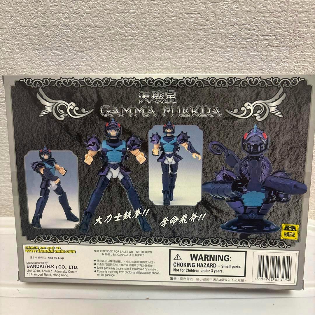 Back of the BANDAI 聖闘士星矢聖衣体系 ガンマ星 フェクタ トール figure box showing photos of the assembled plastic figure in multiple poses and an armor display.