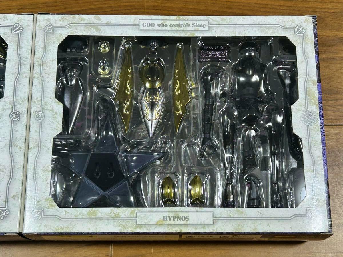 Blister tray view of the Hypnos Saint Cloth Myth figure and its armor/accessory pieces inside the inner packaging.