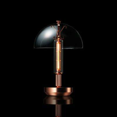 Copper desk lamp with a clear dome shade and a visible tubular bulb on a black reflective background.