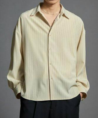 Model wearing the men's polyester loose shirt in a light vertical-striped pattern, front view.
