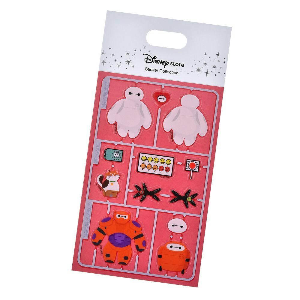 Disney Store sticker sheet labeled "Sticker Collection" showing Baymax and related plastic-model-style stickers on a pink backing.