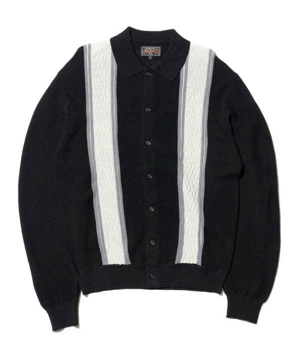 Front flat-lay of the BEAMS PLUS Knit Polo Stripe men's wool button-up polo jacket in black with white and gray vertical stripe panels.