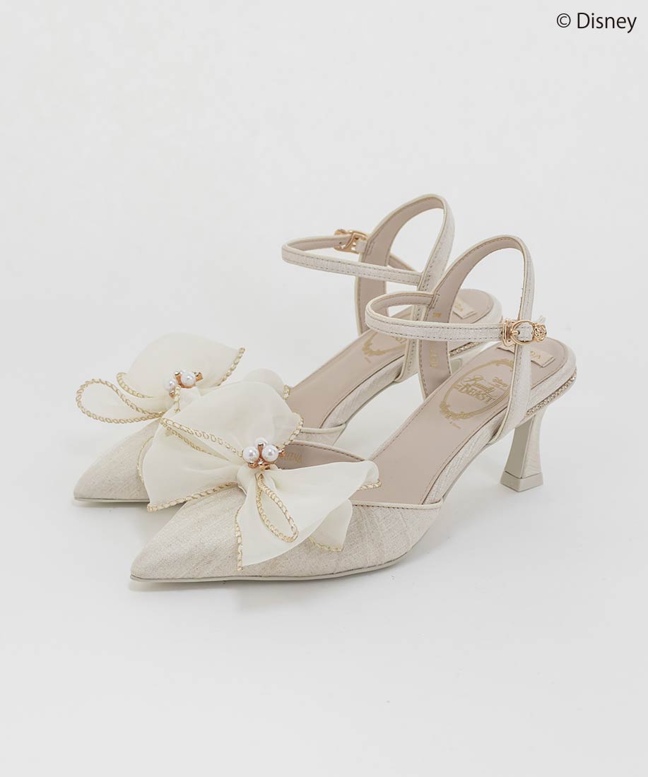 Light-colored 2WAY dress-up ankle strap pumps with pointed toes and large decorative bows on the front.