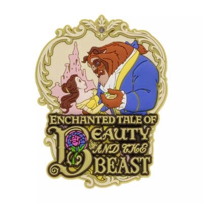 Decorative fridge magnet showing Belle and the Beast embracing above the text “Enchanted Tale of Beauty and the Beast.”
