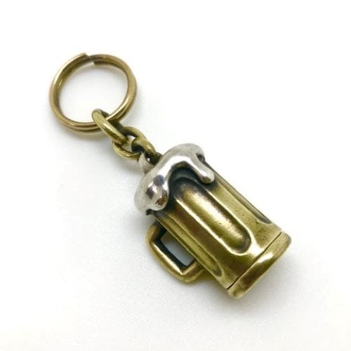 A zinc alloy beer mug keychain with foam detail and attached split ring on a white background.