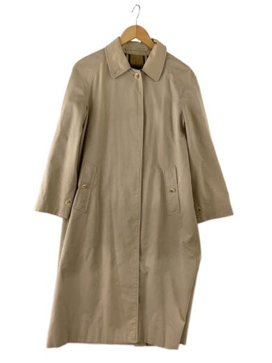 Front view of a beige cotton women's stand-collar coat hanging on a wooden hanger.