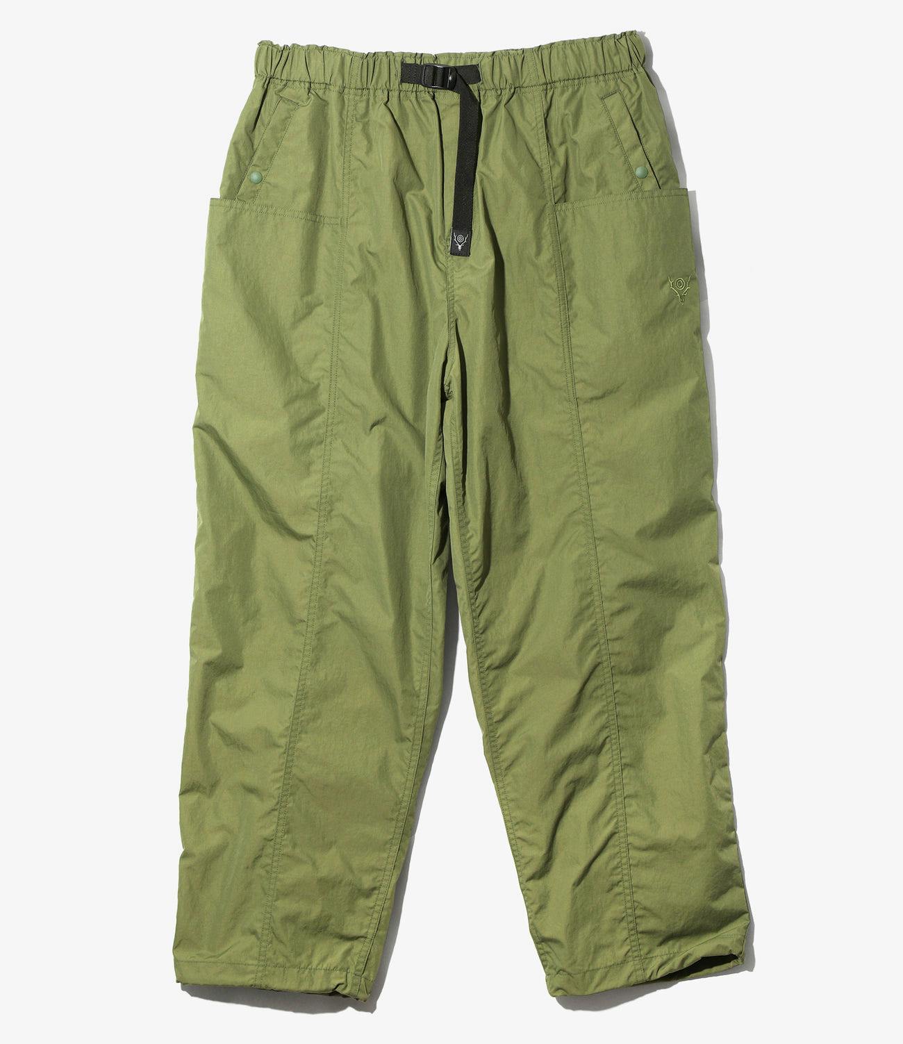 Front view of green Belted C.S.Pant (nylon tussah) laid flat showing the waistband, integrated belt, and front pockets.