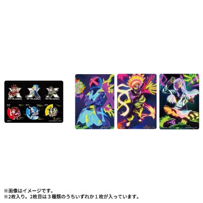 A white-background photo showing a sheet of small BEYBLADE X character stickers and three larger colorful rectangular BEYBLADE-themed stickers.