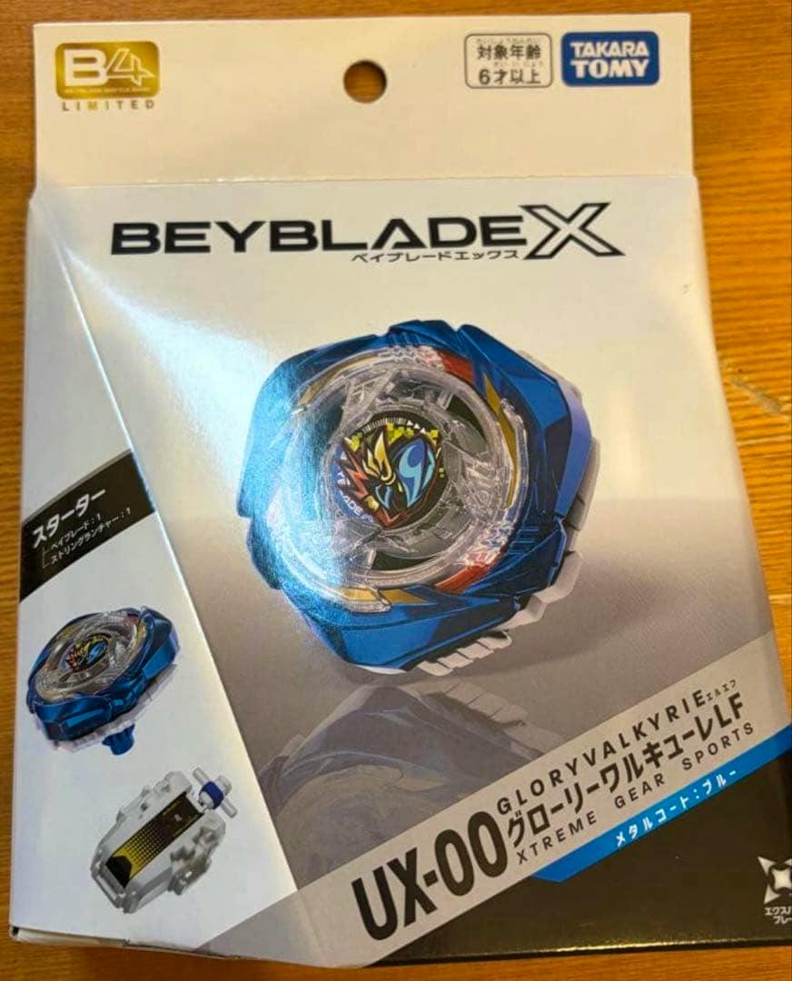 Photo of the boxed Beyblade X UX-00 Glory Valkyrie LF Metal Coat Blue toy showing the blue beyblade artwork on the front of the package.