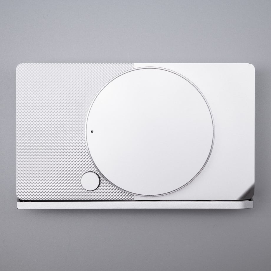 Silver aluminum BF-TAP SV camera plate (Sigma BF cover) shown flat on a gray background.