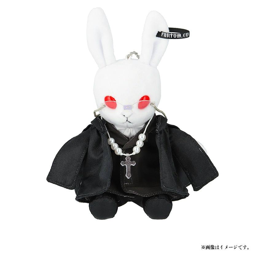 Plush 'Bitter Rabbit' (Sebastian) Public School Edition wearing a black coat and a pearl cross necklace photographed on a white background.