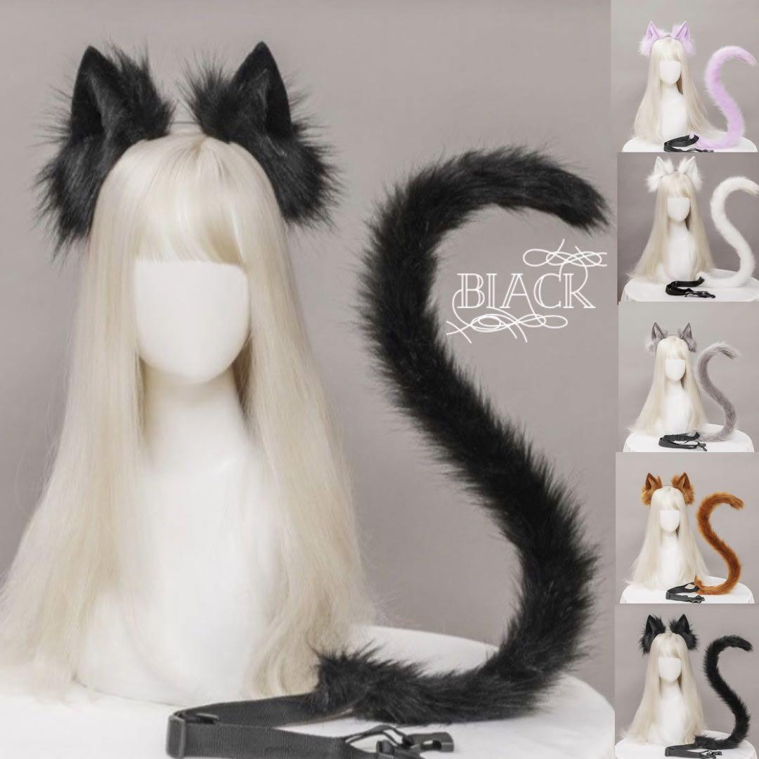 A mannequin head with a long wig wearing a black cat ear headband displayed beside a matching black cat tail.