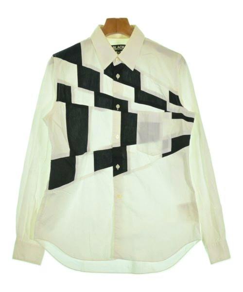 Front view of the men's BLACK COMME des GARÇONS cotton shirt with a black geometric print hanging on a hanger.