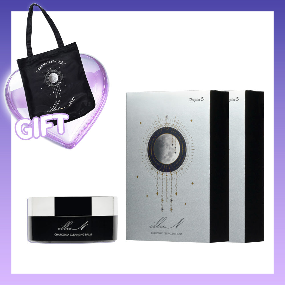 Photo of the Black Edition Set showing two silver decorative boxes, a black round jar, and a black tote bag labeled “GIFT.”