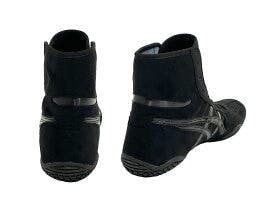 Rear and side view of a pair of black leather boots.